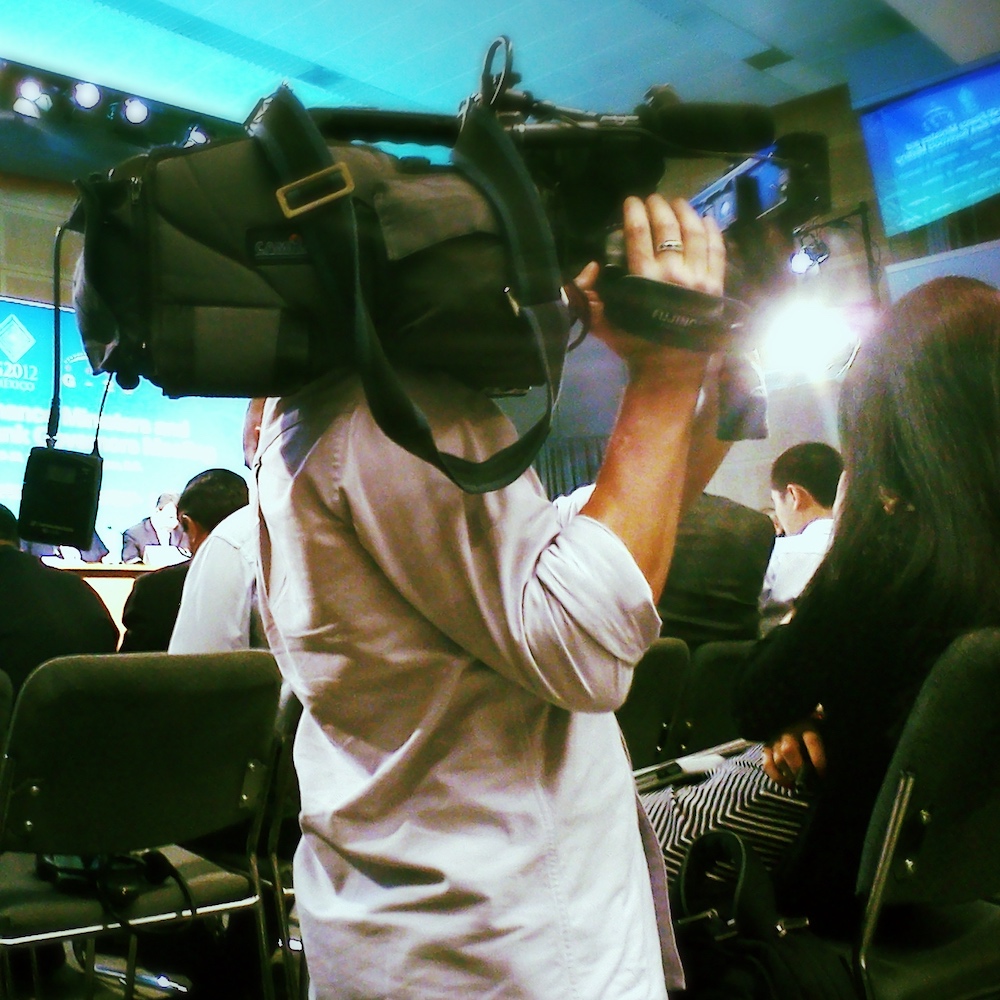 cameraman at news conference