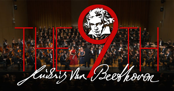 Orchestra performing with text overlay: