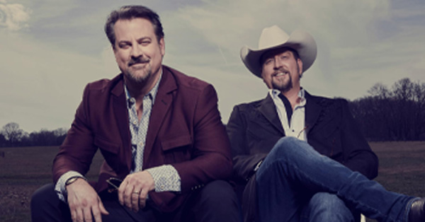 This image features the country music duo Wilson Fairchild, composed of cousins Wil and Langdon Reid.
