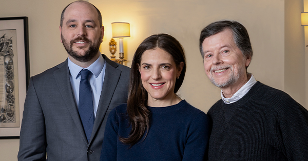 David Schmidt, Sarah Botstein and Ken Burns standing for a photo.