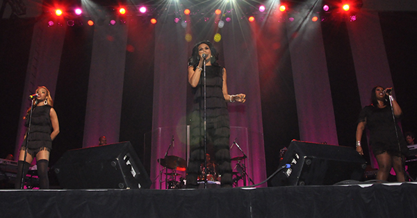 The Pointer Sisters, Sadako Pointer, Ruth Pointer and Issa Pointer, on stage performing.