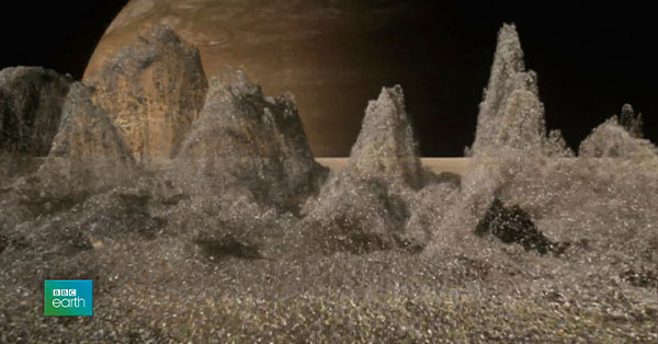 A computer generated image looking at Saturn from one of its moons.